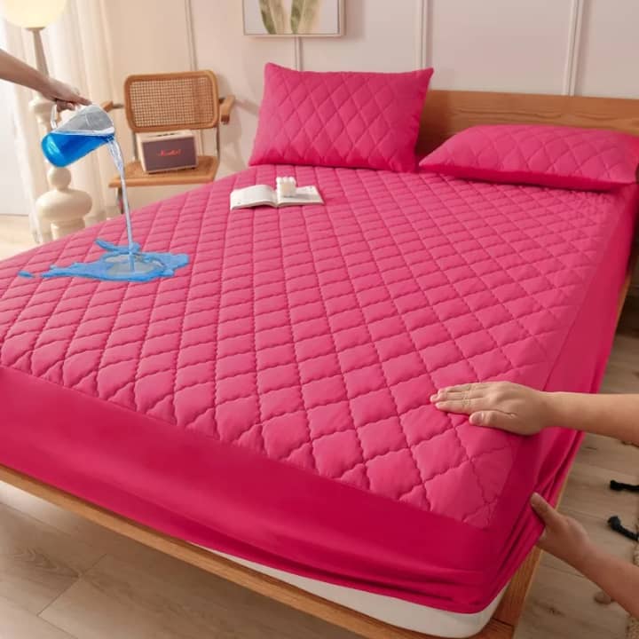 Housse magique 100% imperméable + 2 oreillers offerts !