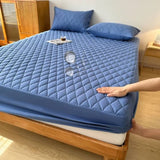 Housse magique 100% imperméable + 2 oreillers offerts !